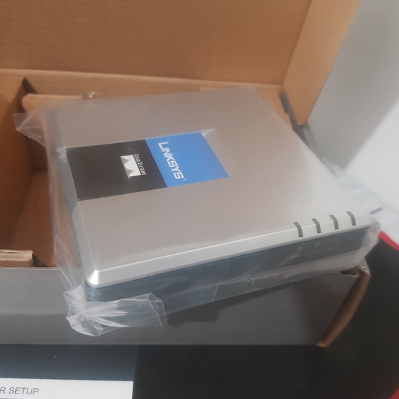 COPY - Cisco Small Business PAP2T-NA Internet Phone Adapter with 2 VoIP Ports - Picture 6 of 8